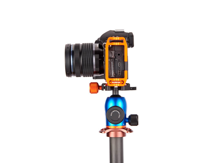 OM System OM1 on Lexie - Side view