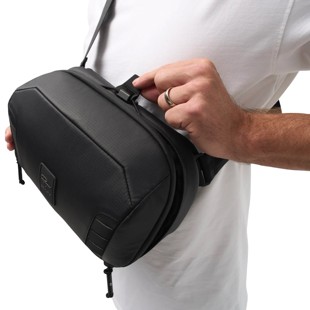 McKinnon Camera Sling 5L showing easy open tab